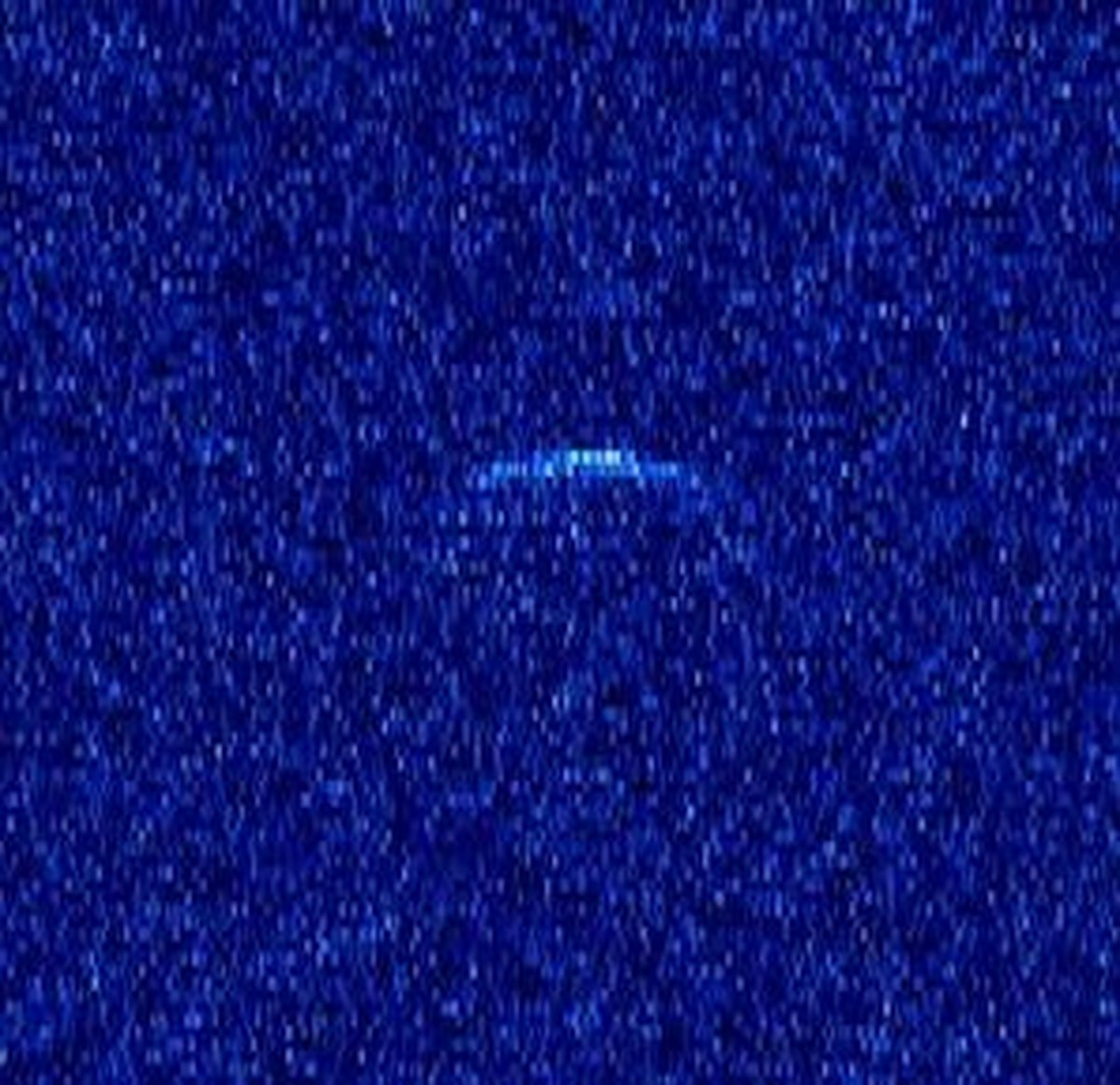 A blue starry image with a blur in the middle
